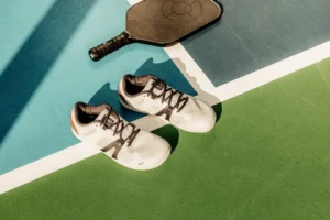 Xero 360 Rally barefoot court shoes on pickleball court with paddle