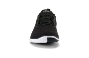A black Nexus Knit athletic shoe from Xero Shoes with black laces, a white sole, and "Xero" on the tongue, shown from a front view against a white background—perfect for fans of minimalist footwear.
