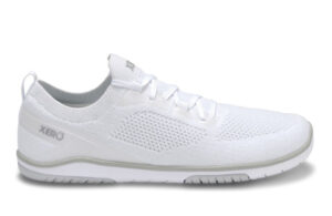 A white athletic sneaker from Xero Shoes with a mesh upper, lace-up closure, and low-profile sole. This minimalist footwear features "Xero" branding on the side and heel tab, complemented by subtle gray accents on the sole.