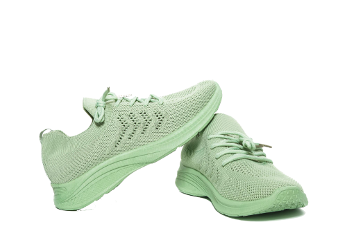 A pair of mint green barefoot shoes on a black background.